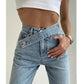 High waisted jeans with sloping waistband